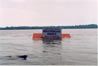 Many busineses were closed during the flood like the one depicited in this photo of a Riverboat Ride Sign under water