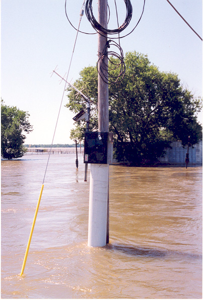 Photo of the Temporary Gaging Station—Gaging stations were moved to telephone poles for temporary locations to stay above the high water.